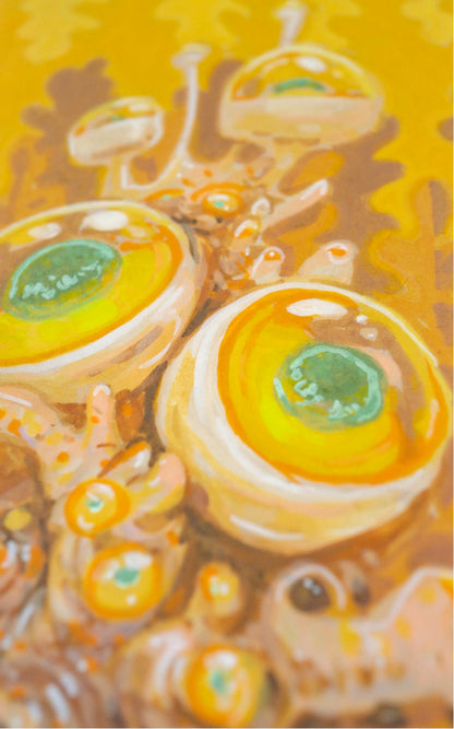 Close-up of Eye Pod Nanos, showing two large glossy eye pods with green centers.